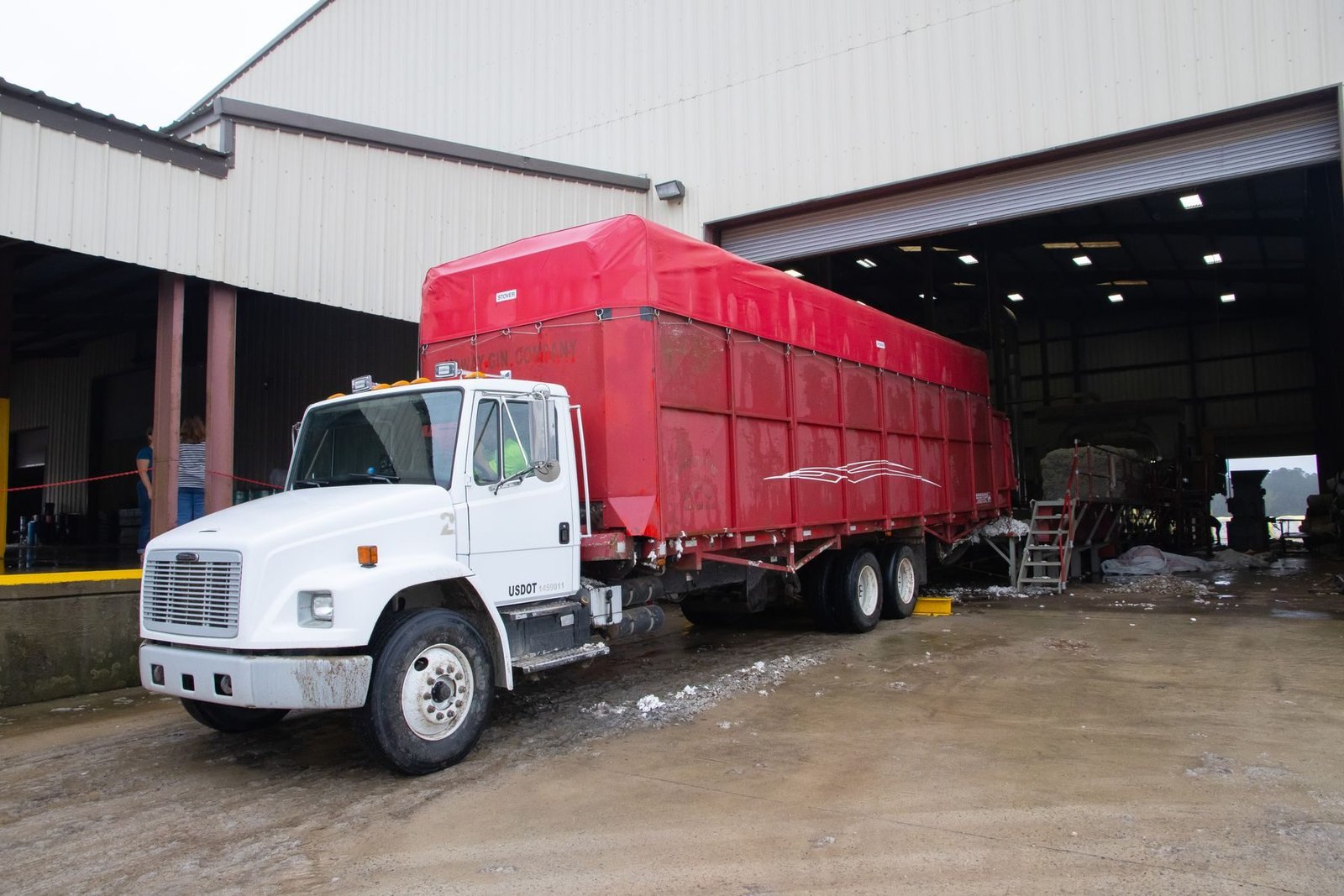 Freight truck being prepared for transportation